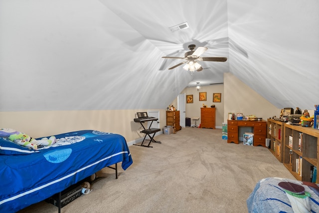 bedroom featuring ceiling fan, light colored carpet, and vaulted ceiling