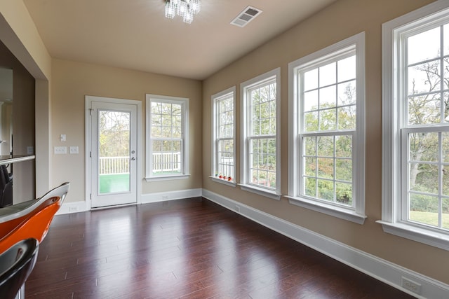 interior space with dark hardwood / wood-style flooring