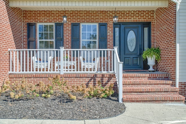 property entrance with a porch