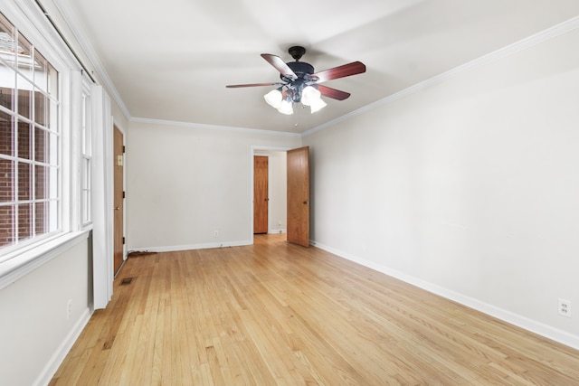 unfurnished room with light hardwood / wood-style flooring, ceiling fan, and ornamental molding