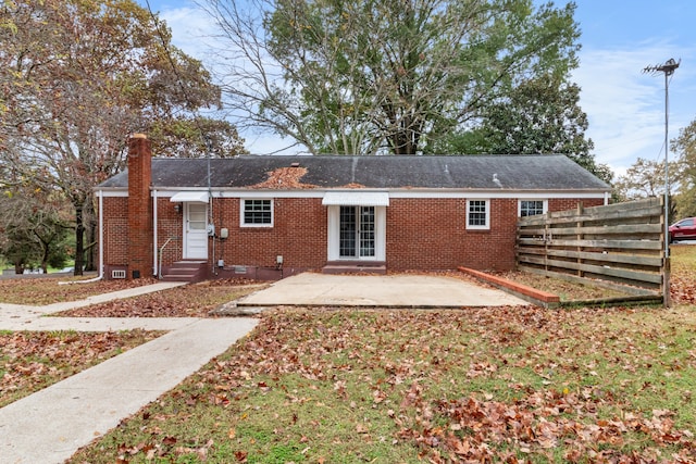 rear view of house with a patio area