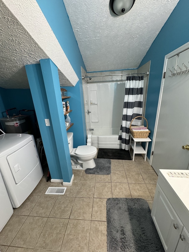 full bathroom featuring tile patterned flooring, shower / bath combo, toilet, and a textured ceiling