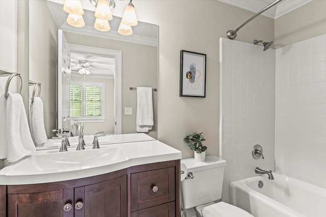 full bathroom featuring vanity, crown molding, tiled shower / bath combo, ceiling fan, and toilet