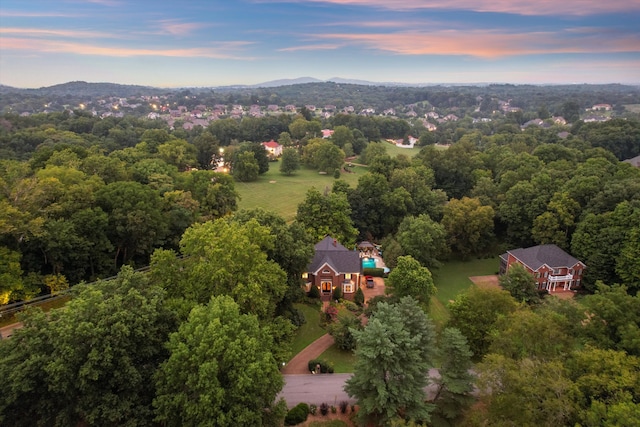 aerial view at dusk with a mountain view