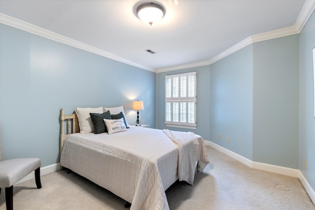 bedroom with ornamental molding and light carpet