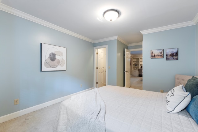 bedroom featuring carpet flooring and crown molding