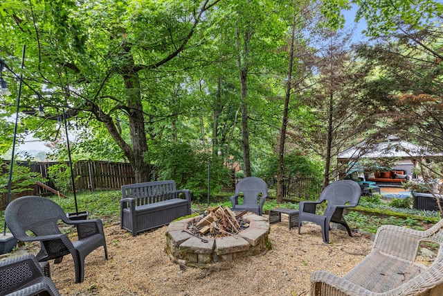 view of patio / terrace with an outdoor fire pit