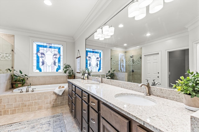 bathroom with plus walk in shower, vanity, tile patterned floors, and ornamental molding