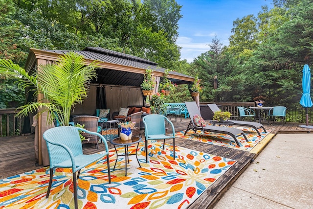 view of patio featuring a gazebo and a wooden deck