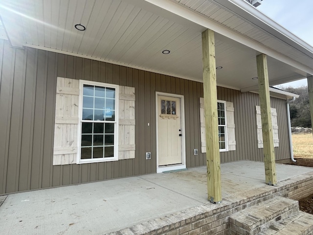 doorway to property with a porch