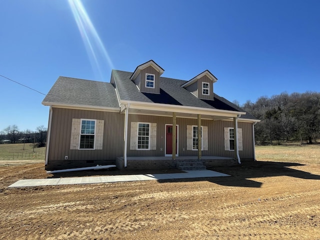 view of front of house featuring a shingled roof, crawl space, and covered porch