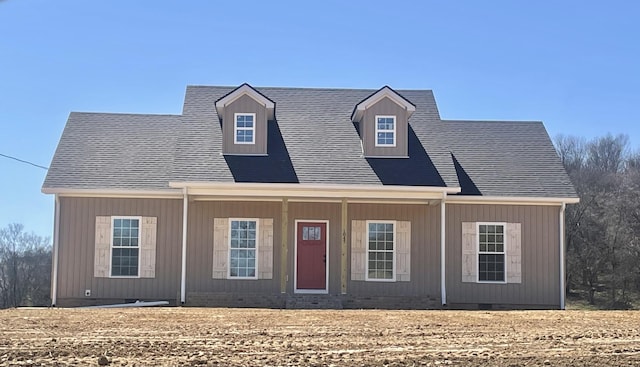 cape cod house featuring crawl space and a shingled roof