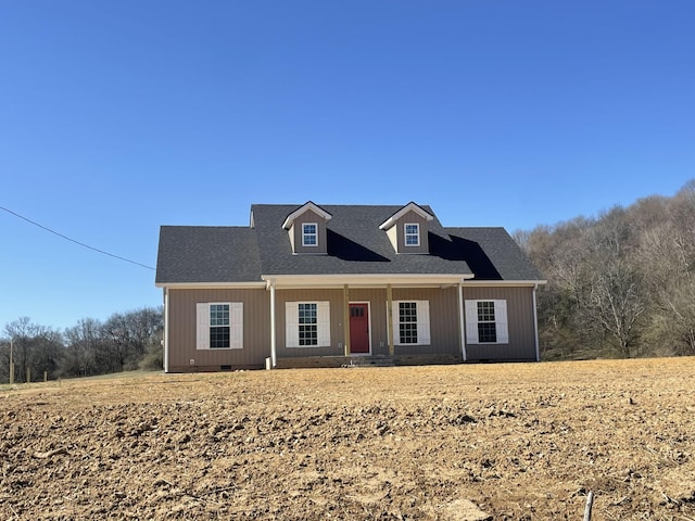 view of front of house with roof with shingles and crawl space