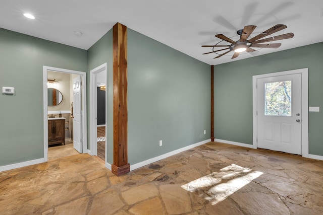 entrance foyer with ceiling fan