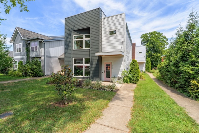 view of front of home with a front yard