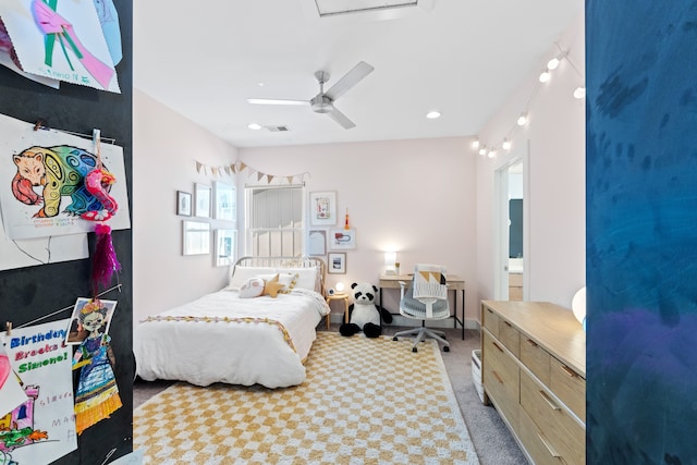 bedroom featuring light carpet and ceiling fan