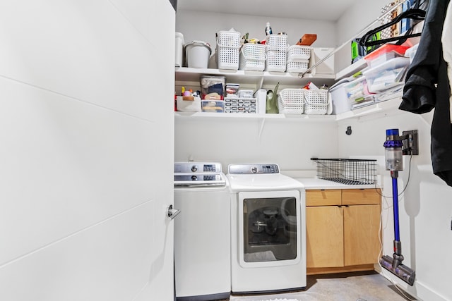 laundry area featuring independent washer and dryer