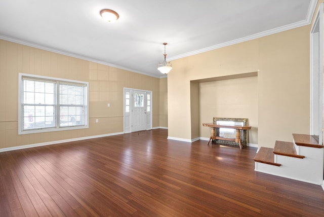 interior space with dark hardwood / wood-style floors and ornamental molding