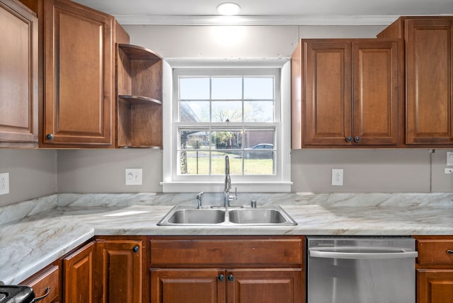 kitchen featuring dishwasher, ornamental molding, and sink