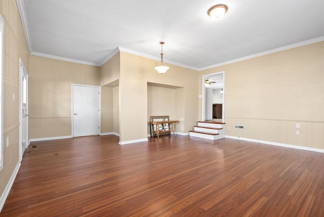 unfurnished living room with dark hardwood / wood-style floors, ceiling fan, and ornamental molding