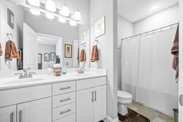 full bathroom featuring vanity, toilet, and shower / bath combo with shower curtain