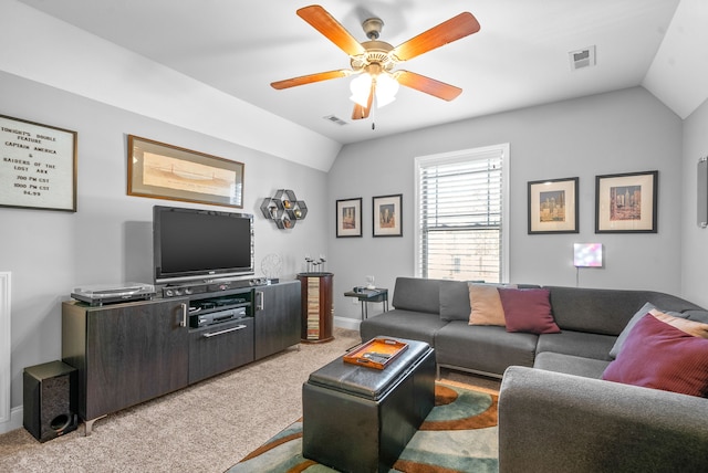 living room with ceiling fan, light carpet, and lofted ceiling