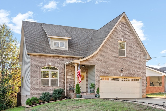 view of front facade featuring a garage and a front lawn