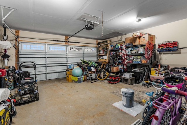 garage featuring a garage door opener