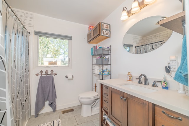 bathroom featuring tile patterned floors, walk in shower, vanity, and toilet