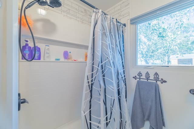 bathroom with walk in shower