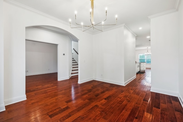 unfurnished dining area featuring crown molding and dark wood-type flooring