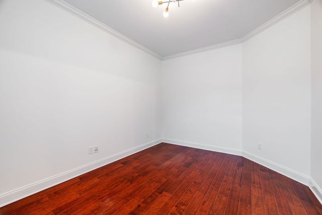 unfurnished room with crown molding and wood-type flooring