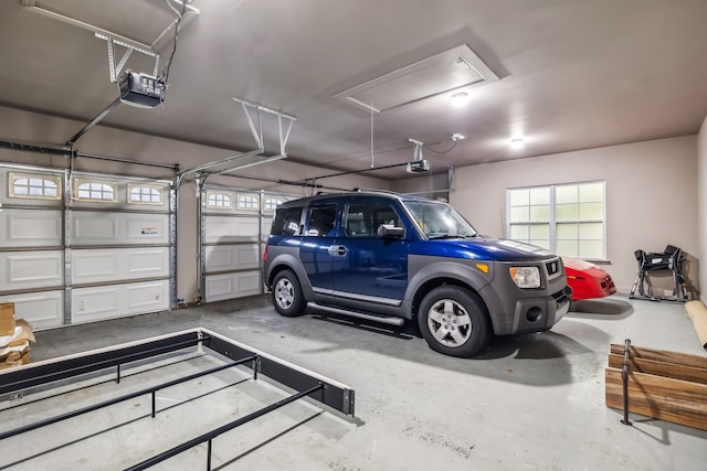 garage featuring a garage door opener