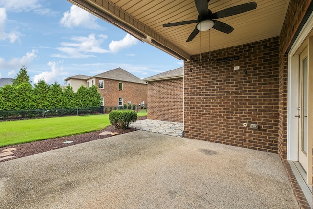 view of patio featuring ceiling fan