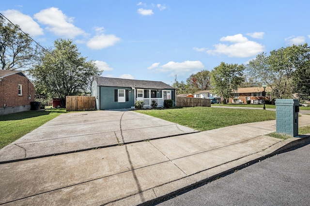 single story home with a front yard