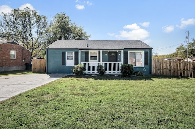 single story home featuring a front yard and a porch