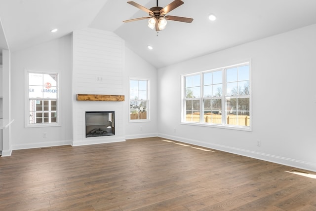 unfurnished living room with a fireplace, high vaulted ceiling, ceiling fan, and dark wood-type flooring