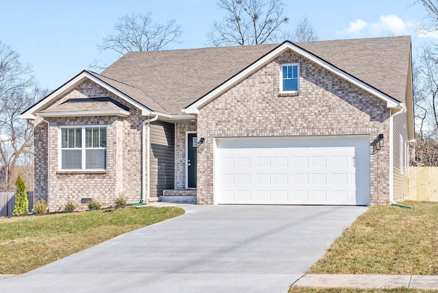 view of front facade with a front lawn and a garage