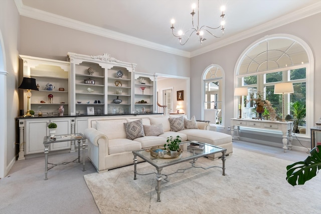 living room with a chandelier, light colored carpet, and crown molding