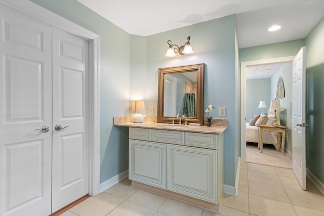 bathroom with vanity and tile patterned floors