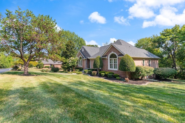 view of front of property with a front lawn