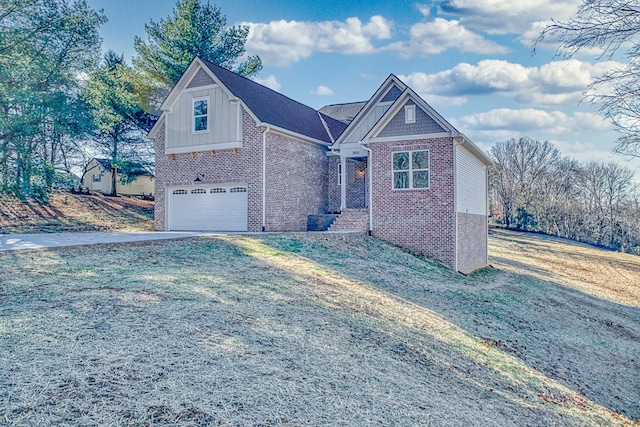 view of front of home with a garage and a front yard