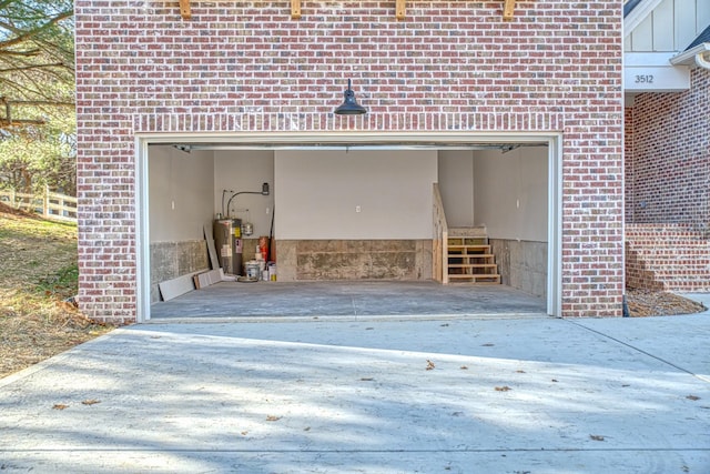 garage featuring water heater