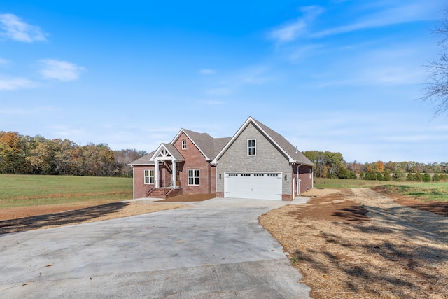 view of front of home with a front lawn and a garage