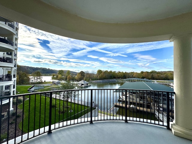 balcony featuring a water view