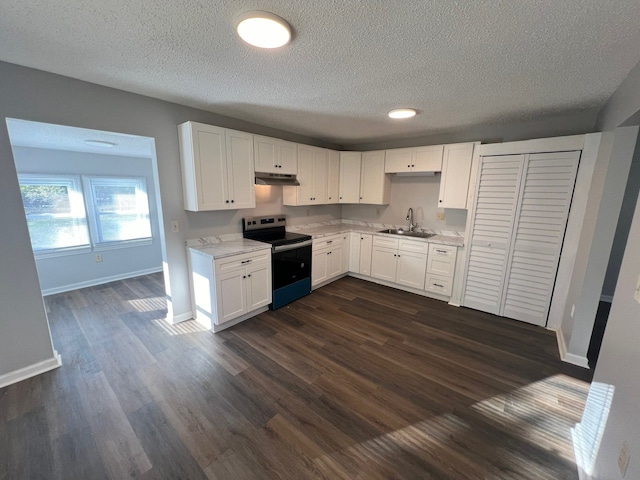 kitchen with a textured ceiling, dark wood-type flooring, sink, white cabinetry, and stainless steel range with electric cooktop