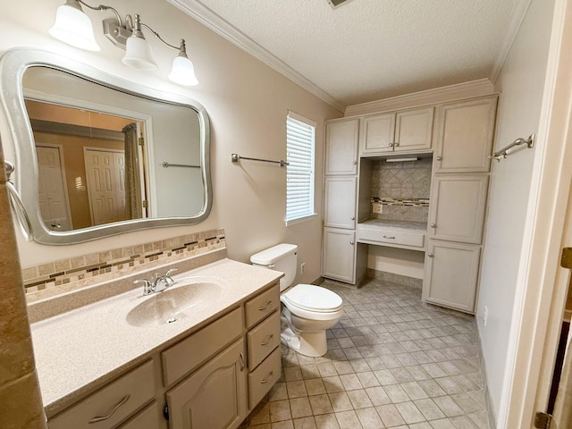 bathroom with vanity, tile patterned flooring, ornamental molding, a textured ceiling, and tasteful backsplash