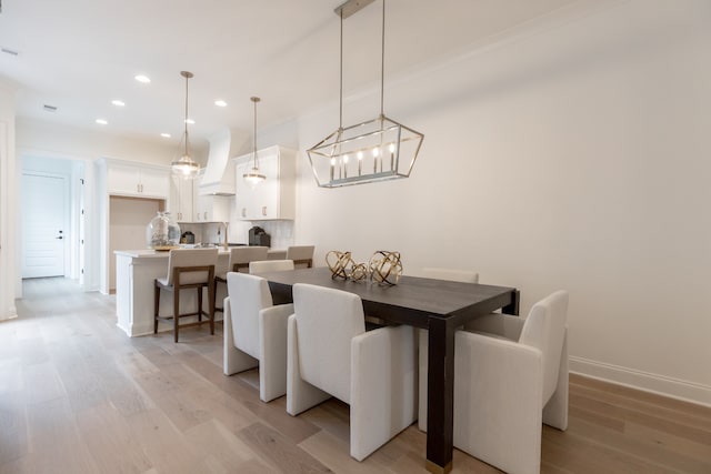 dining room featuring light hardwood / wood-style flooring