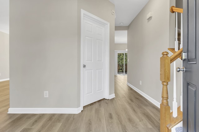 hallway featuring light hardwood / wood-style floors