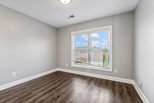 3200 Long Blvd Unit 4, Nashville, TN 37203 - unfurnished room featuring baseboards and dark wood-style floors